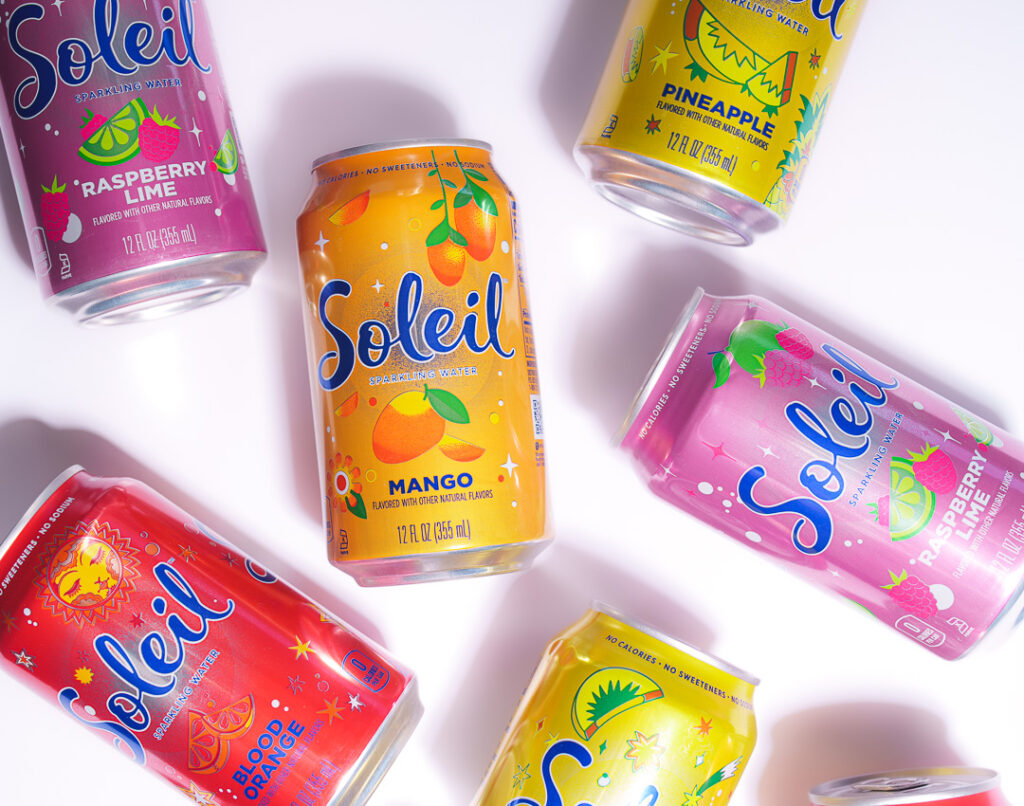7 Ways a Brand Photoshoot Can Save You Time Creating Social Media Content 12 7 cans of Soleil laying on their sides on a white background.