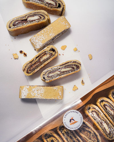 Top-down flatlay image of roll cookies fro Emily's Bakery.