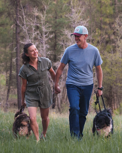 Jason and Debbie of Elemental Brand Photo walk their dogs through the forests of Flagstaff, AZ