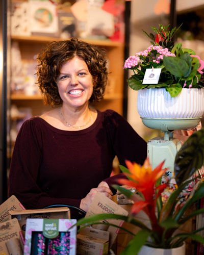 Just a Little Something poses for the camera in her shop.