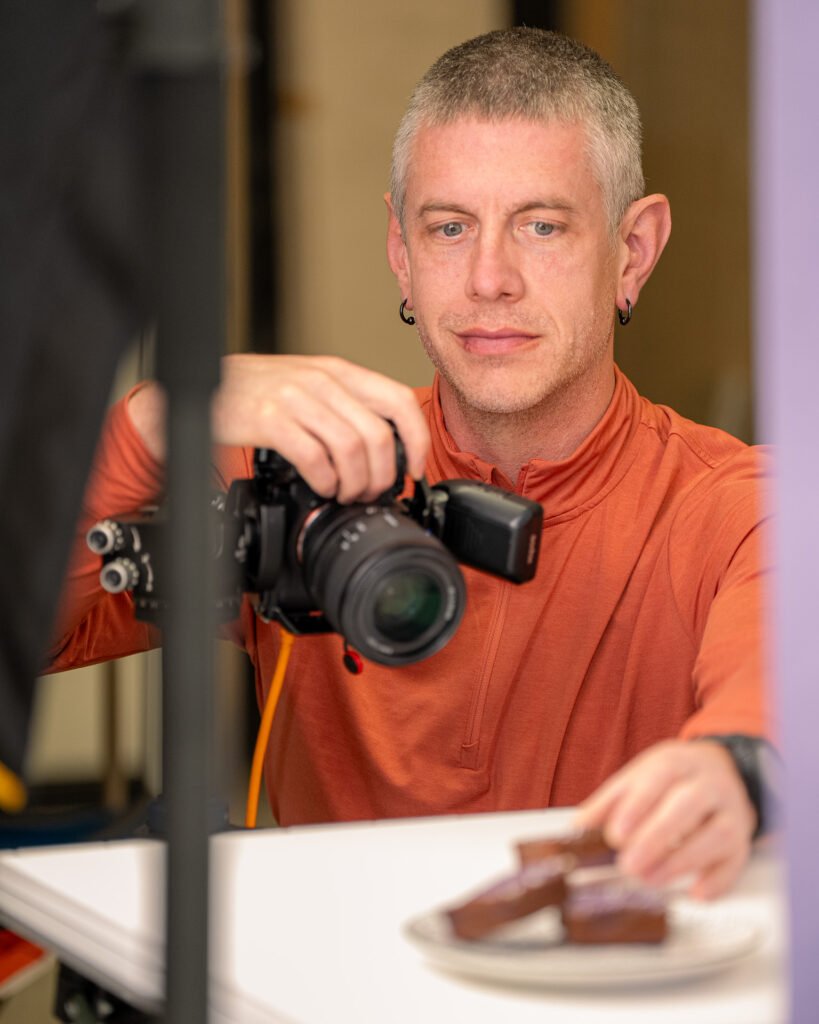 Jason making a small adjustment to the product before shooting the scene.