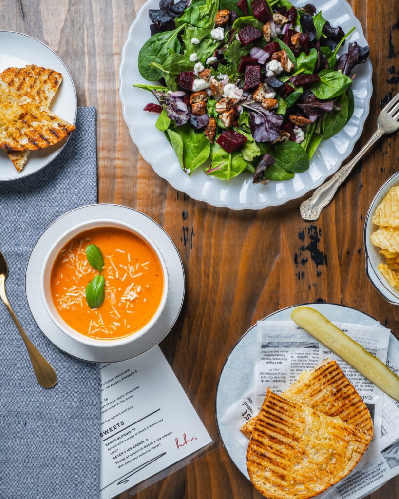 Seattle restaurant photography. Table flatlay from a House & Hazel restaurant photoshoot showcasing dishes available on menu