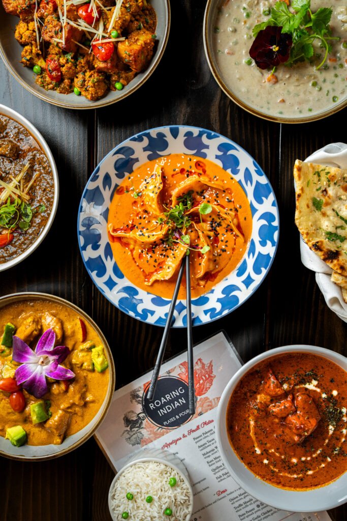 Seattle restaurant photography. Top-down view of a bunch of curry dishes available at a local Indian restaurant.