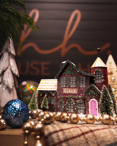 A well-staged product shot in front of the brand’s signage reinforces identity, showcases offerings, and communicates the House & Hazel story visually, strengthening recognition and connection with customers. Santa Claus' workshop sits amongst more decor at House & Hazel