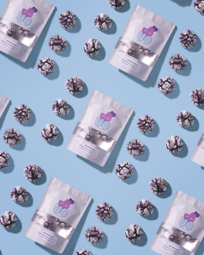 Repetitive patterns create an eye-catching image that captures the viewers eyes in and focus on the product Repetitive pattern of Ube Crinkle Cookies and their packaging
