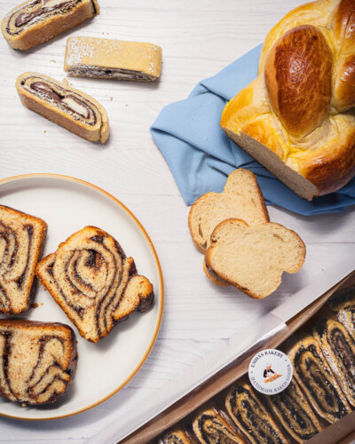 Seattle Product Photography for Emily's Bakery in Maple Valley, WA. Image features top sellers of the local cottage bakery - including babkah, challah, and rolled cookies - showcasing the detail and quality of the local, small-businesses baked goods. Evergreen images shot in soft, even lighting created for social media collaboration to hightlight the unique, high-quality baked goods available online & at the Maple Valley Farmer's market. Seattle Product Photography - Emily's Bakery - Maple Valley, WA - Rolled cookies, babkah, and challah - Elemental Brand Photography