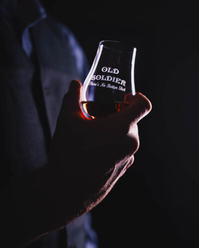 Seattle Product Photography for Old Soldier Distillery in Tacoma, WA - elegant & moody glencairn filled with bourbon created for marketing the local, small-batch pacific northwest distillery Seattle Product Photography - elegant bourbon glencairn - Old Soldier Distillery in Tacoma, WA - Elemental Brand Photography