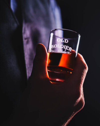 Seattle Product Photography for Old Soldier Distillery in Tacoma, WA - elegant & moody shotblass filled with bourbon created for marketing the local, small-batch pacific northwest distillery and social media advertising Seattle Product Photography - elegant bourbon shot glass - Old Soldier Distillery in Tacoma, WA - Elemental Brand Photography
