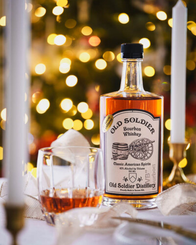 Seattle Product Photography for Old Soldier Distillery in Tacoma, WA showcasing the seasonal marketing imagery for Vanilla Bean Whiskey and Christmas decor with bright lighting and soft, controlled reflections. Created for social media and seasonal marketing campaigns Seattle Brand Photography - Old Soldier Distillery - Vanilla Bean Whiskey seasonal marketing - Tacoma, WA - Elemental Brand Photography
