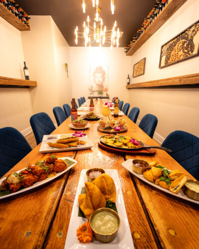 Seattle Restaurant Photography for Roaring Indian Plates & Pours in Maple Valley, WA. Banquet room realty photo showcasing the space that can be reserved for private parties to enjoy high-quality indian food in the Maple Valley area. Social media and marketing content created to showcase the unique experience at the local pacific northwest restaurant. Seattle Restaurant Photography - Roaring Indian Plates & Pours - Banquet Room realty - Maple Valley, WA - Elemental Brand Photography